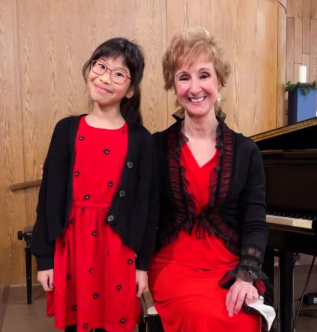 Jacqueline with Aurora following December recital
